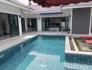 Private Swimming Pool with Sun Loungers and Adjacent Living Space