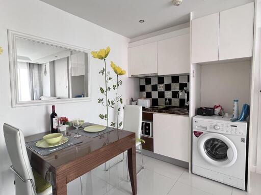 Modern kitchen with dining area and appliances