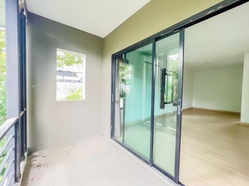Modern building interior with sliding glass doors and spacious empty room