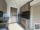 Modern kitchen interior with wooden finish cabinets and built-in appliances