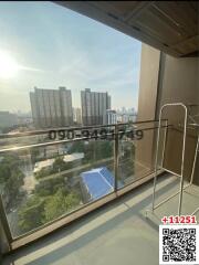 Spacious balcony with city view and clear skies