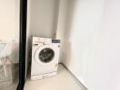 Compact utility room with a washing machine