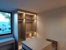 Modern bedroom with built-in wardrobes and ample storage space