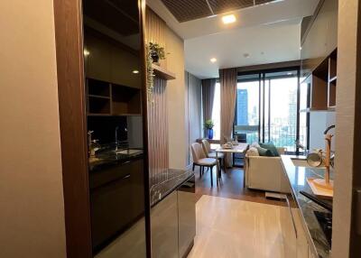 Modern apartment interior showing combined living room and kitchen space