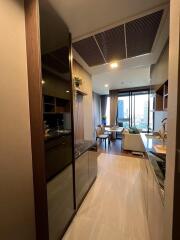 Modern apartment interior showing combined living room and kitchen space