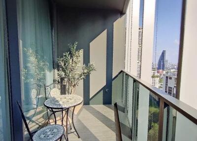 Cozy balcony with seating and city view