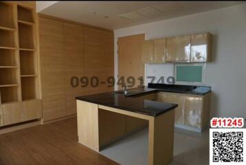 Modern kitchen with center island and wooden cabinetry