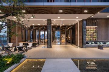 Modern apartment building lobby with elegant design and furnishings