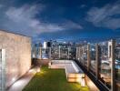 Modern rooftop balcony with skyline view at night