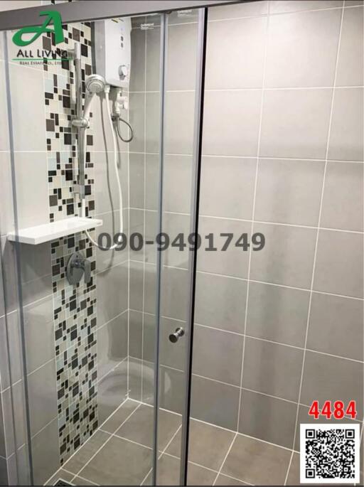 Modern bathroom with glass shower enclosure and wall-mounted water heater