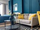Cozy and modern living room with blue walls and comfortable seating
