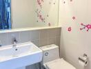 Bright bathroom with decorative flower decals