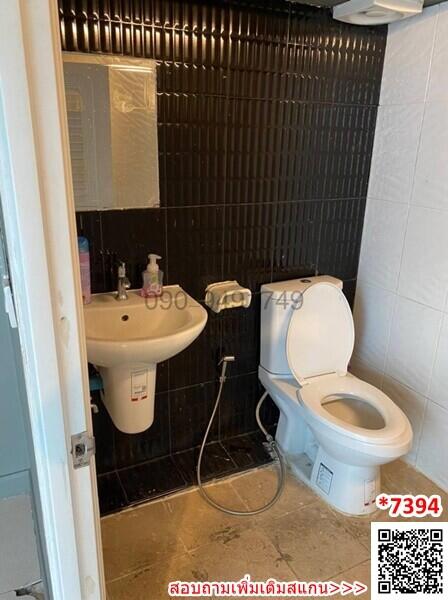 Small Bathroom Interior with Open Door