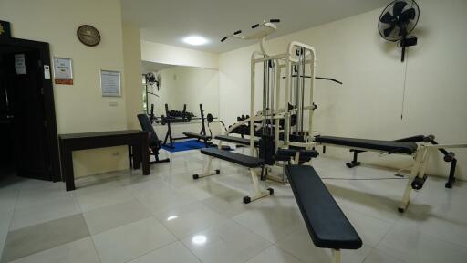 Home gym with various exercise equipment