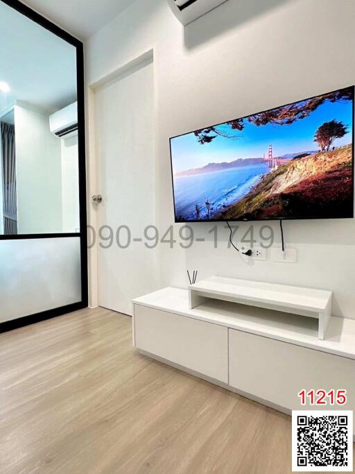Modern living room interior with large flat-screen TV