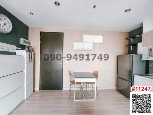 Modern kitchen with dining area in a bright apartment