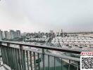 Urban view from an apartment balcony overlooking a residential area