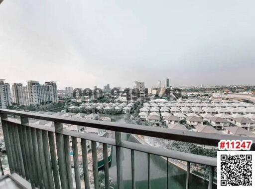 Urban view from an apartment balcony overlooking a residential area