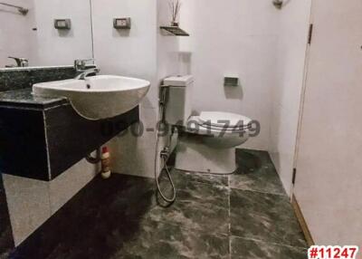 Modern bathroom with gray tiles
