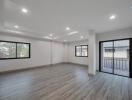 Spacious and well-lit living room with large windows