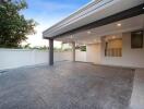 Spacious covered carport area with modern flooring design