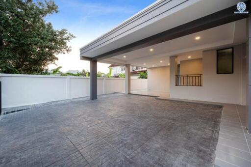 Spacious covered carport area with modern flooring design