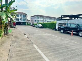 Spacious parking area outside residential buildings