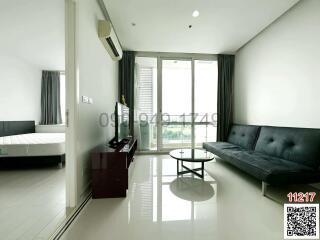 Spacious bedroom with modern furniture and plenty of natural light