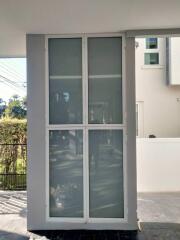 Sliding glass doors leading to the interior of a modern building