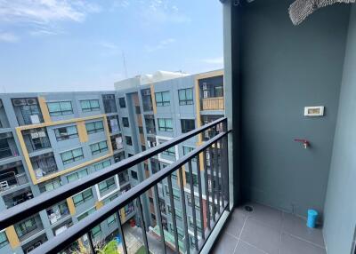 Spacious balcony with a view of the apartment complex