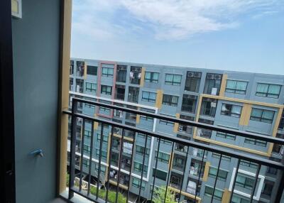 Balcony with view of the exterior buildings and clear sky