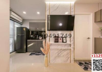 Modern kitchen interior with marble finish and fully fitted appliances
