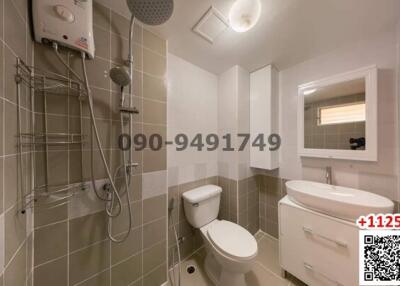 Modern bathroom interior with shower, toilet and sink