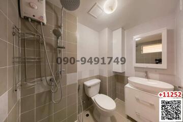 Modern bathroom interior with shower, toilet and sink