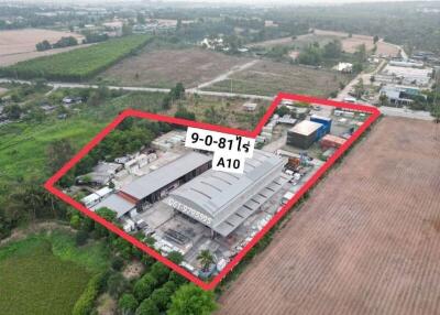Aerial view of an industrial property with outlined boundaries