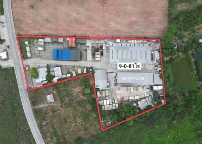 Aerial view of industrial property with clear boundaries and surrounding areas