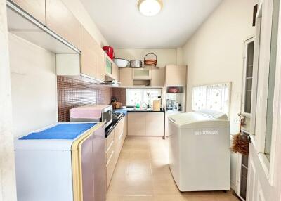 Bright kitchen with modern appliances and ample storage space