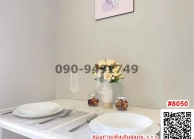 Elegantly set table in a modern dining area with decorative elements