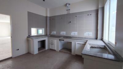 Spacious kitchen with natural light and modern design