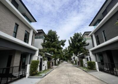 Row of modern townhouses with clear sky