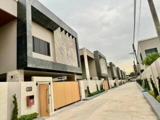 Modern residential townhouses with well-paved street