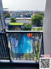 Balcony with pool view in a residential area