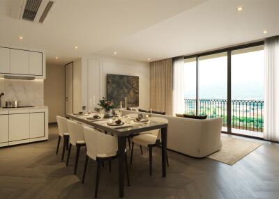 Elegant dining room with adjacent modern kitchen overlooking a scenic view