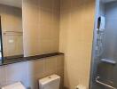 Modern bathroom interior with beige tiles