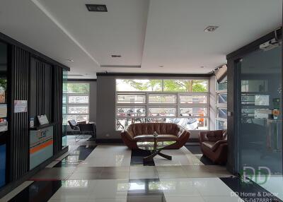 Spacious and modern living room with stylish furniture and ample natural light