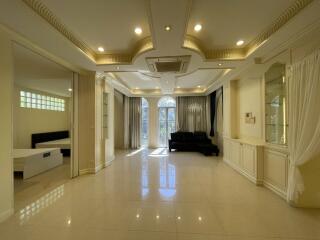 Spacious and elegantly designed living room with natural light