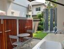 Cozy outdoor patio area with seating and integrated sink