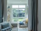 Cozy bedroom with natural light and stylish decor