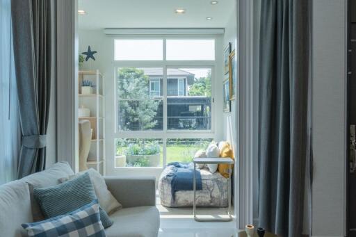 Cozy bedroom with natural light and stylish decor