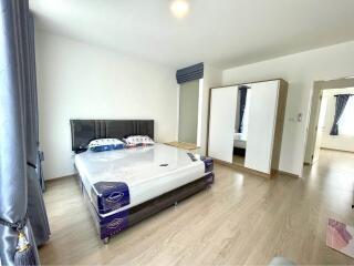 Spacious Bedroom with King-Size Bed and Modern Amenities